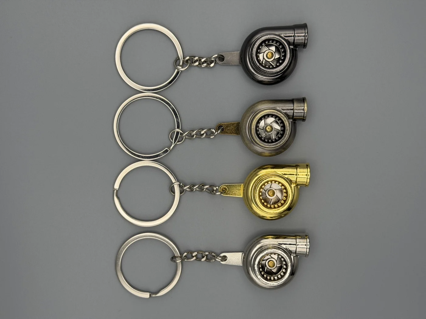 All four SHOP GHXST turbo keychain finishes